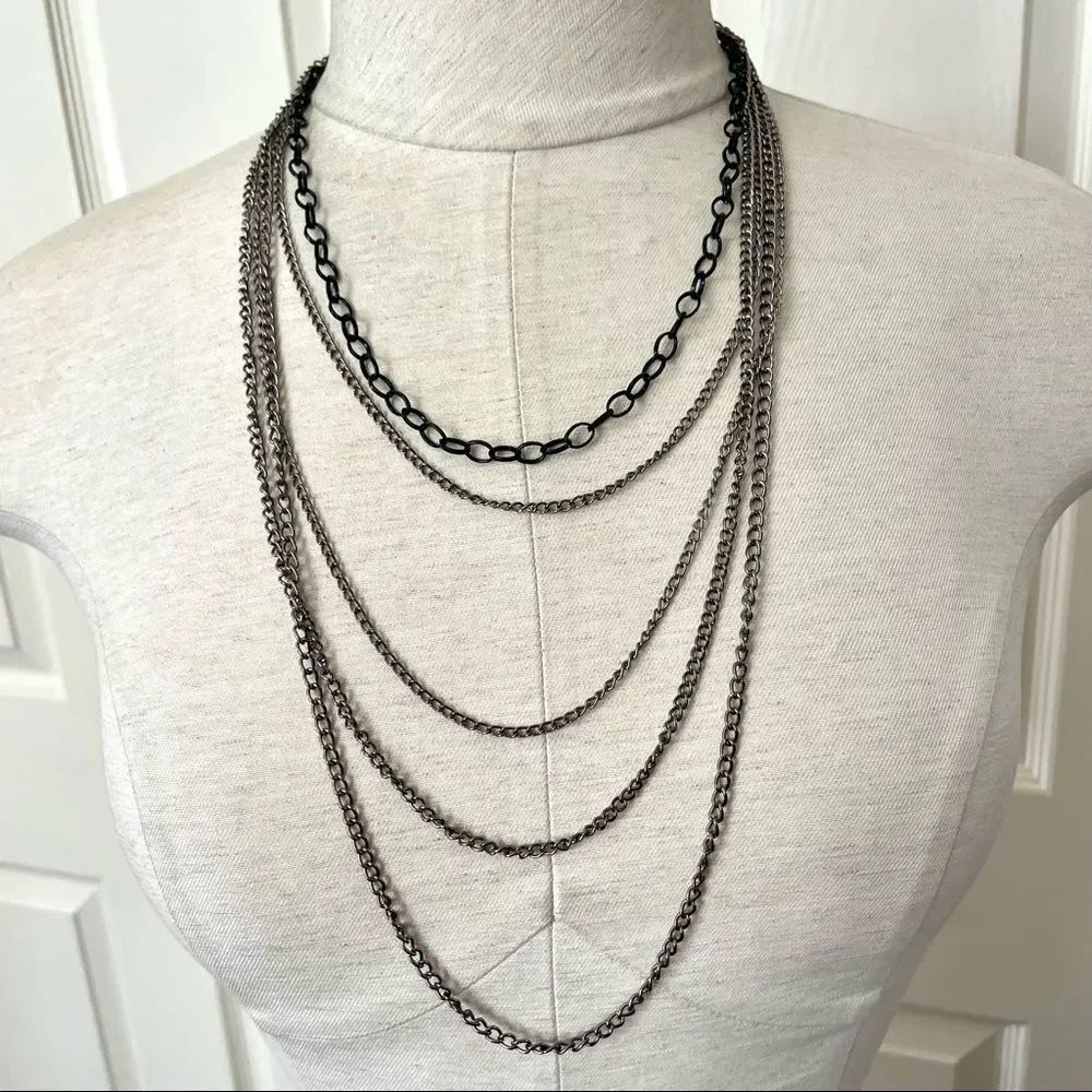 Silver tone and black multi chain necklace